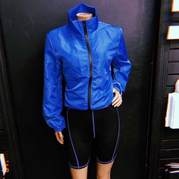 windbreaker and biker shorts